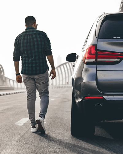 Buyer performing an in-person vehicle inspection